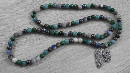 Angled view of sterling silver hybrid pendant highlighting raw textures of nature where woodland meets Atlantic shores.